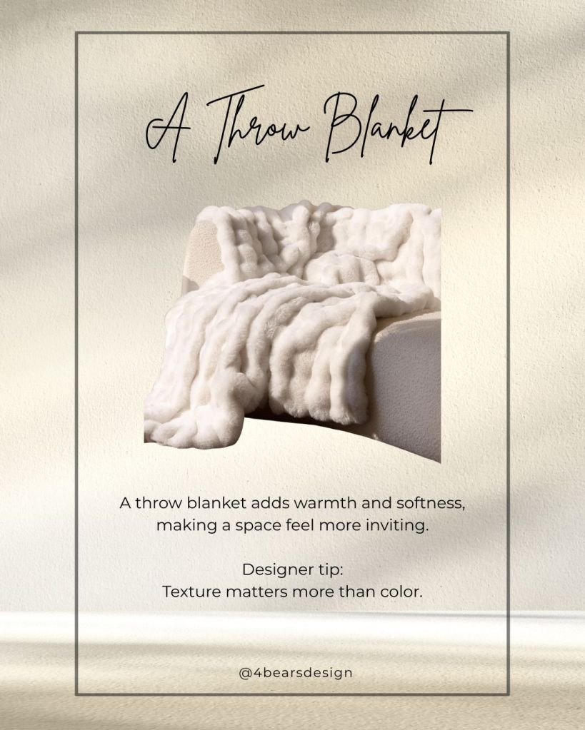 Neutral throw blanket draped over a sofa for warmth and texture
